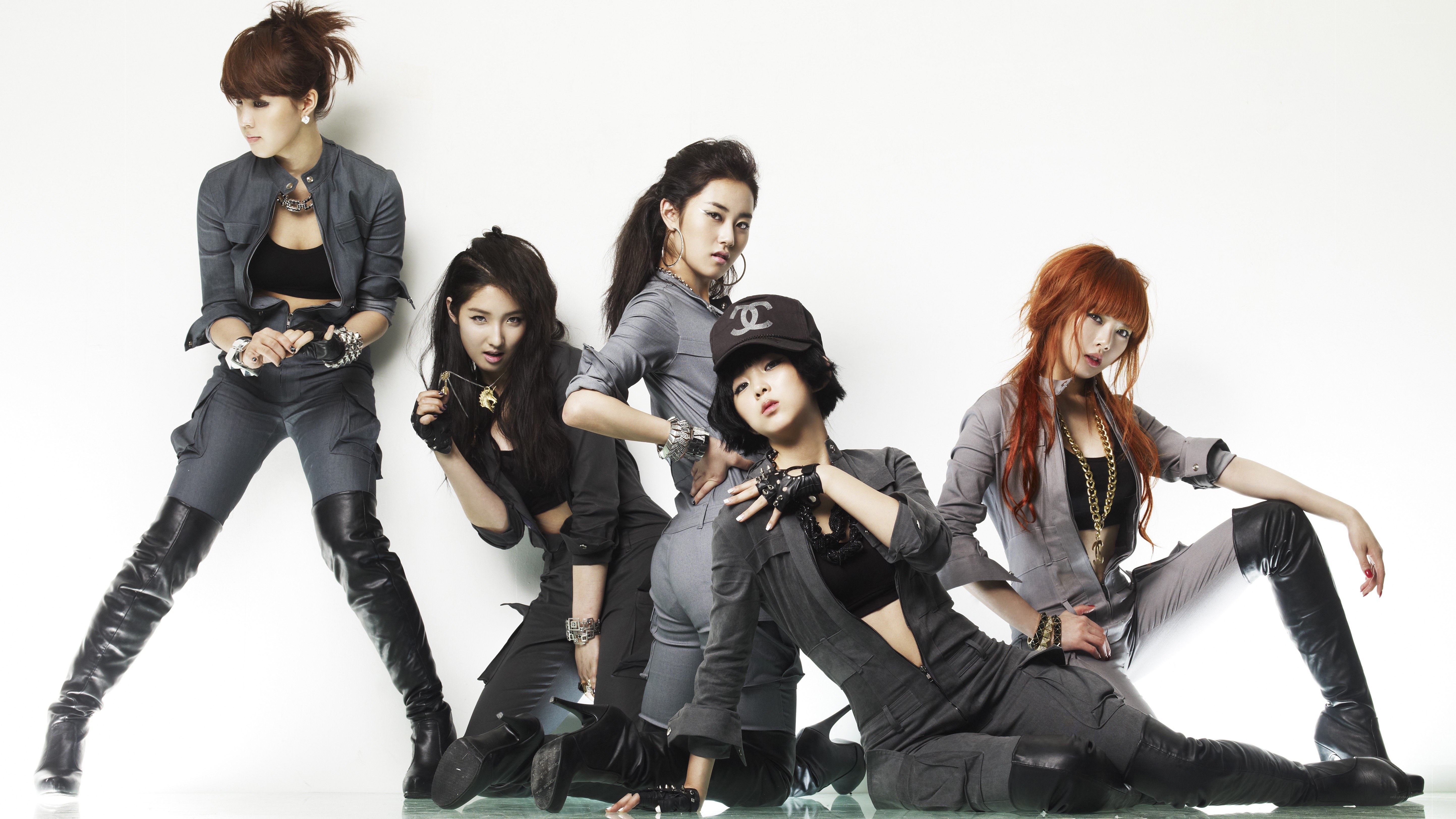 K-pop group in stylish poses