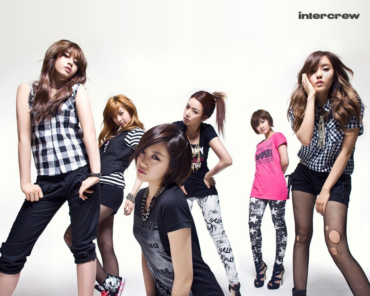 K-pop group in stylish poses