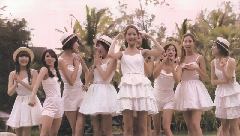 K-pop group in white dresses