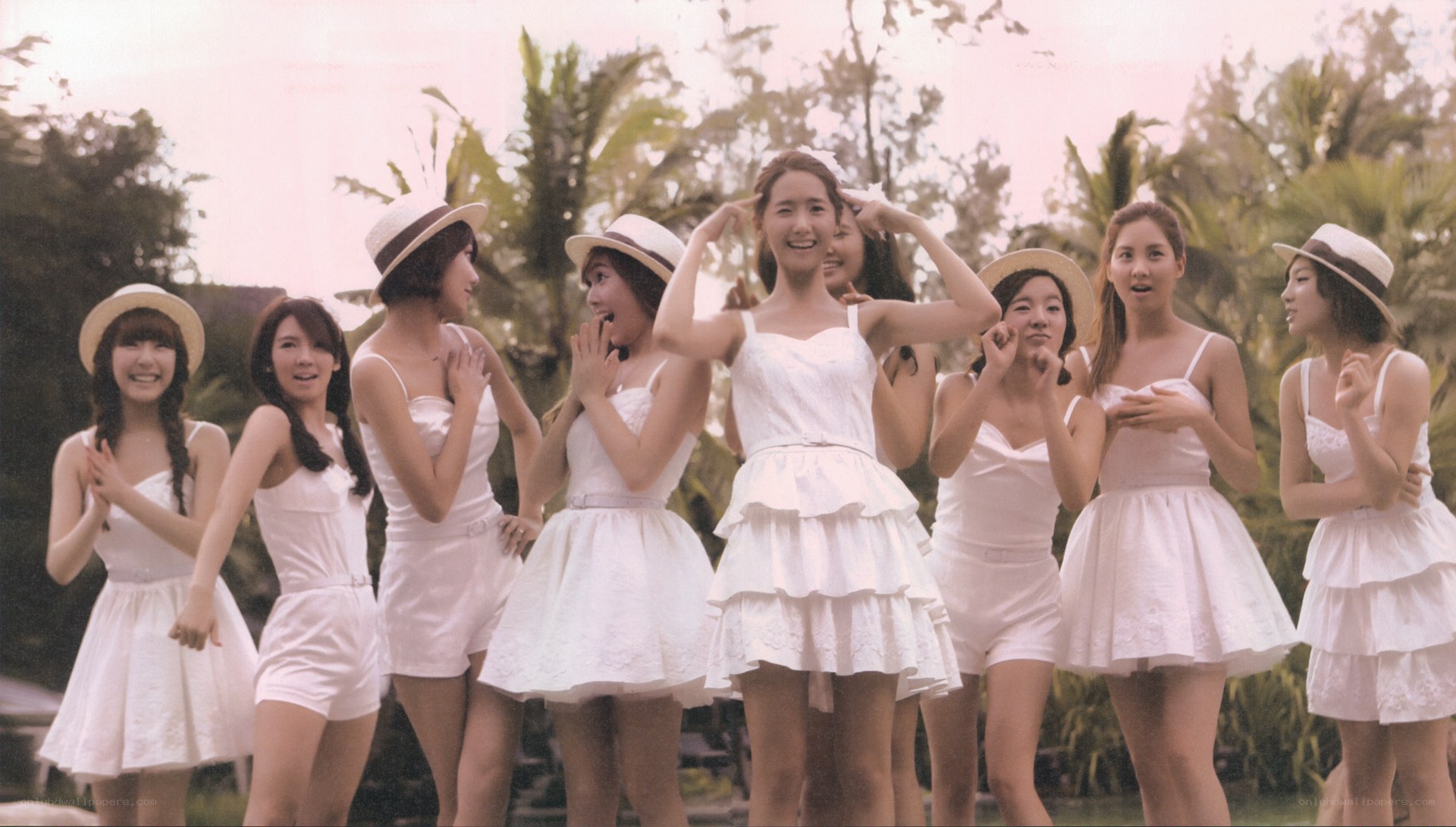 K-pop group in white dresses