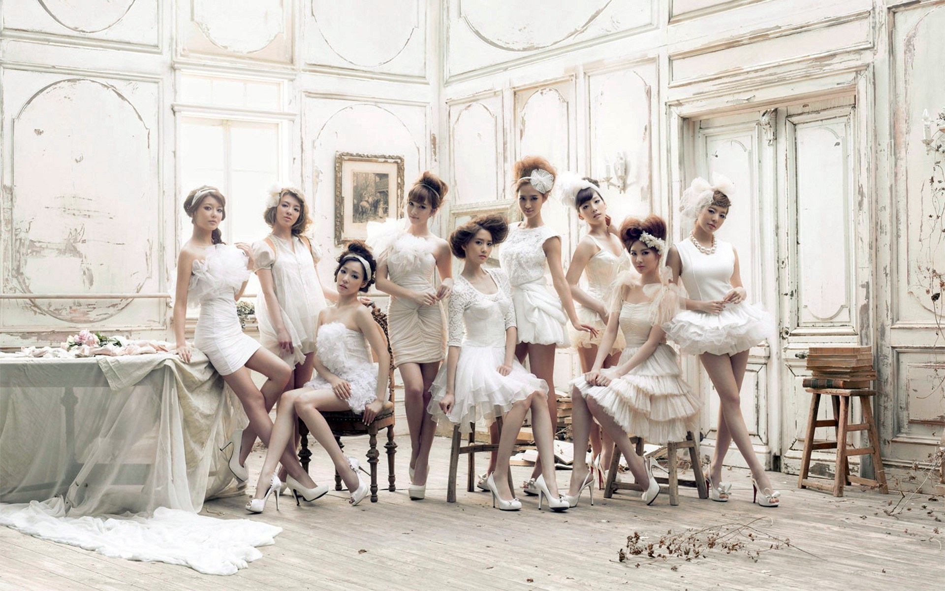 K-pop group in white dresses