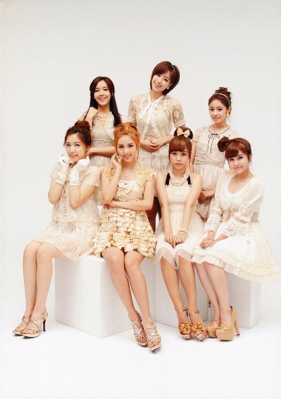 K-pop group in white dresses