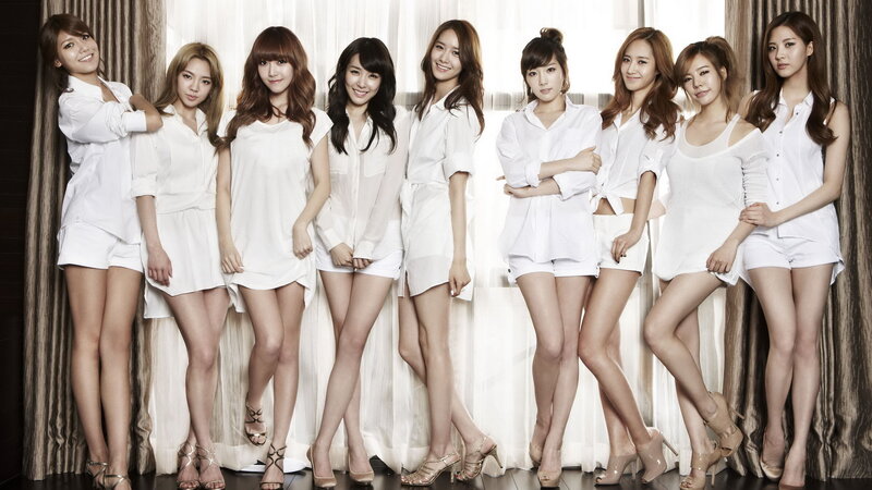 K-pop group in white outfits