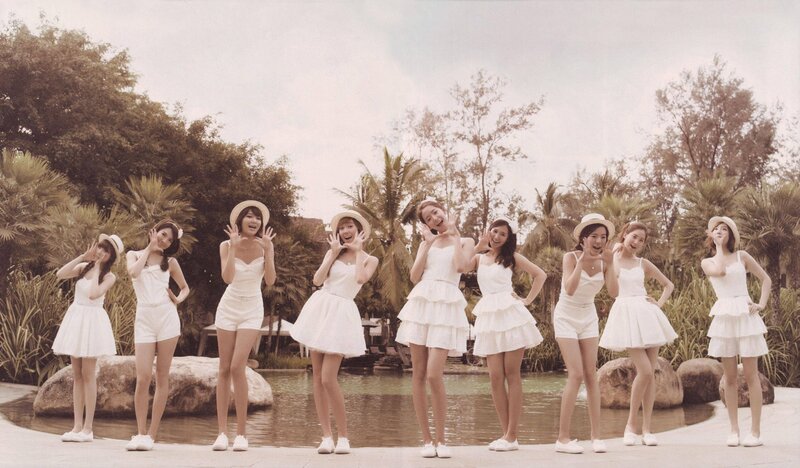 K-pop group in white outfits