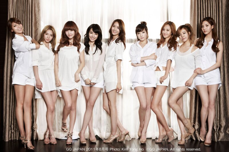 K-pop group in white outfits