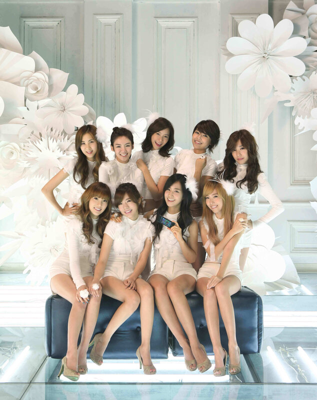 K-pop group in white outfits