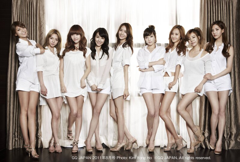 K-pop group in white outfits