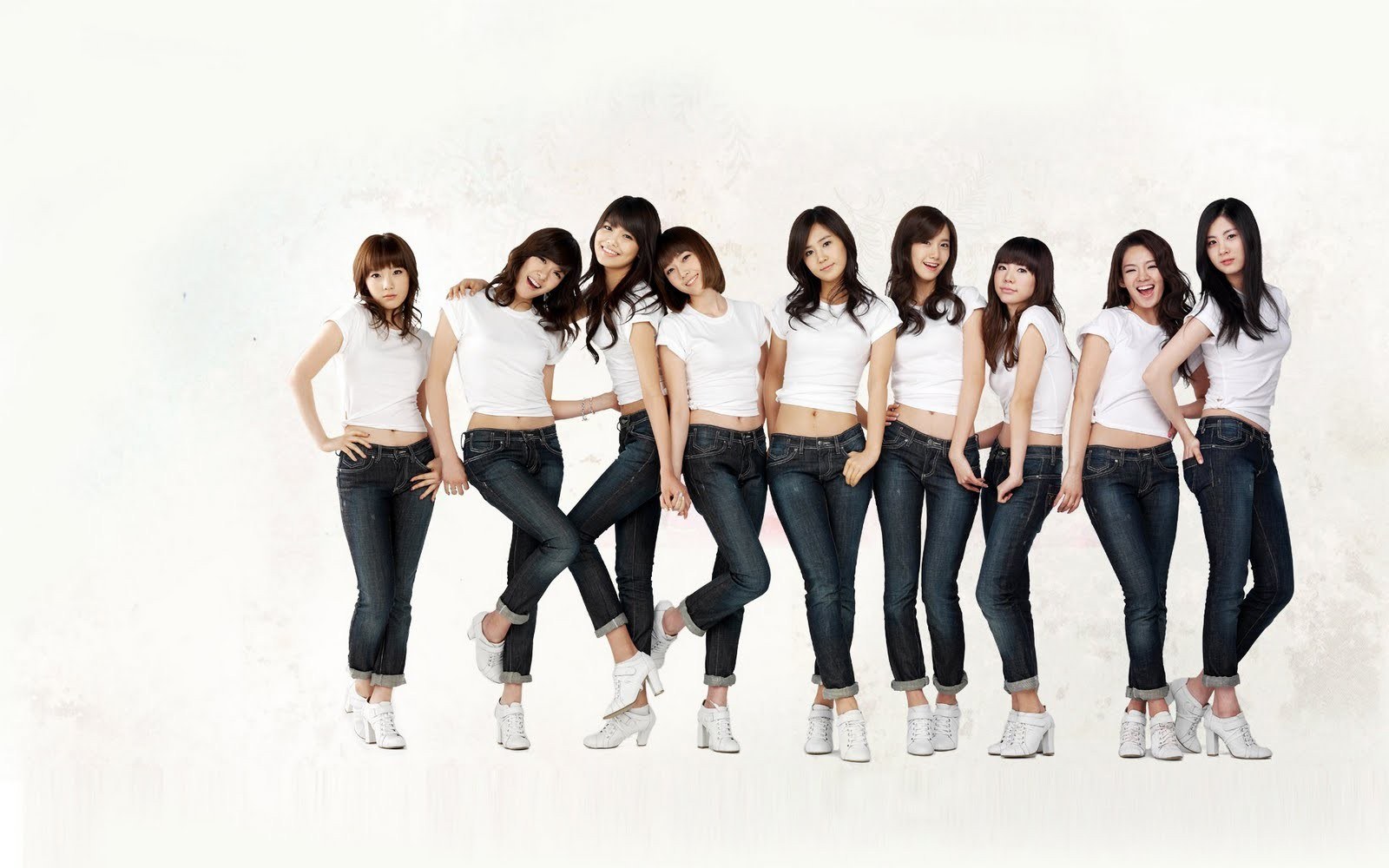 K-pop group in white shirts
