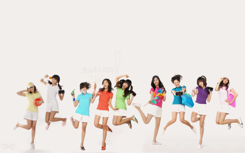 K-pop group jumping in studio