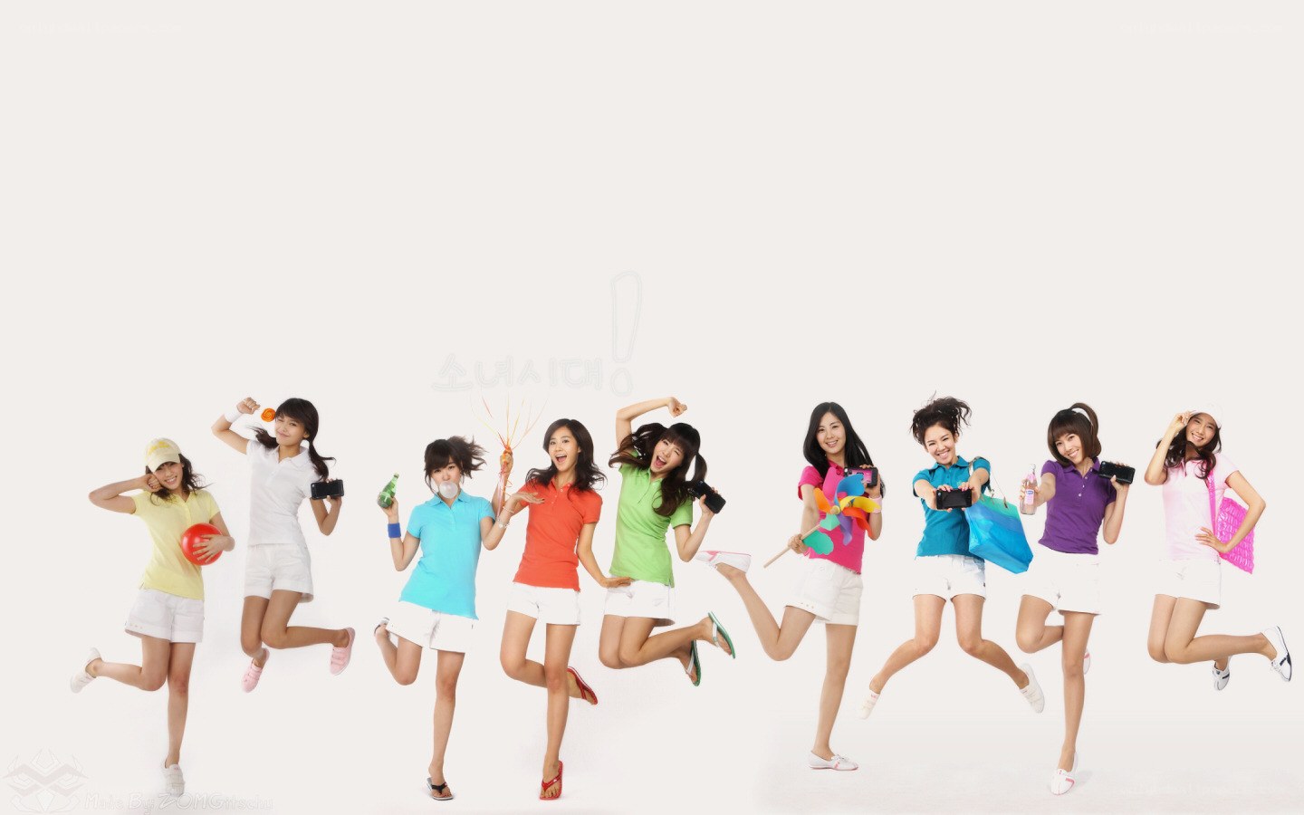 K-pop group jumping in studio