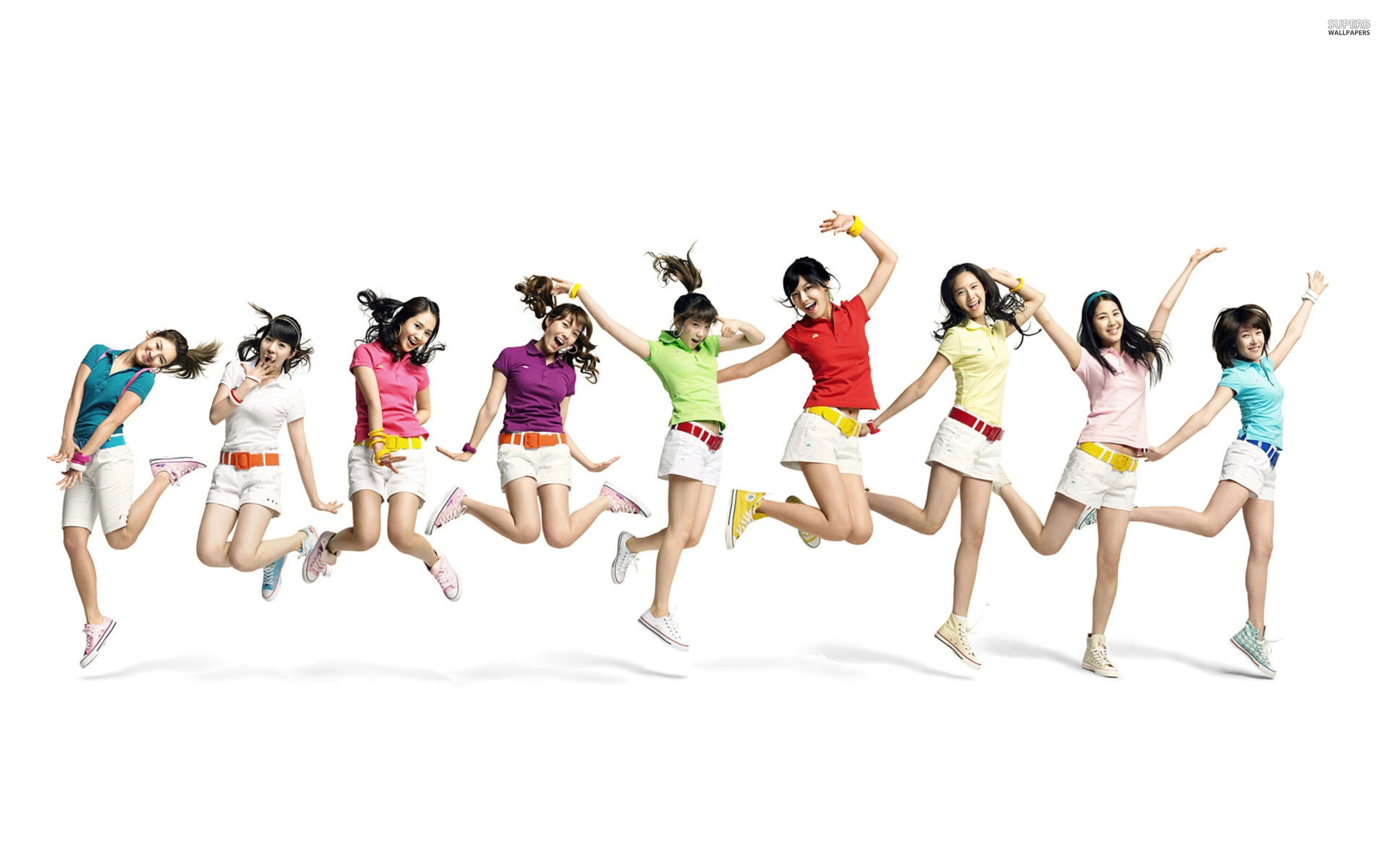 K-pop group jumping in unison