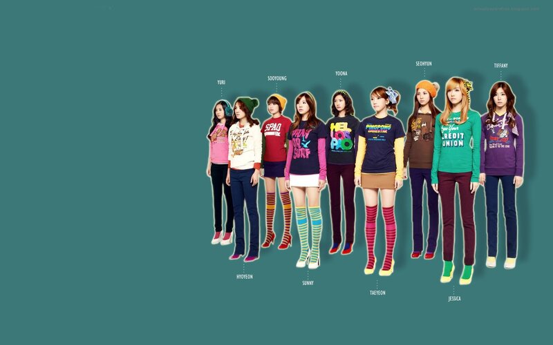 K-pop group members in colorful outfits