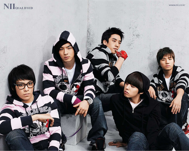 K-pop group Nii in striped hoodies