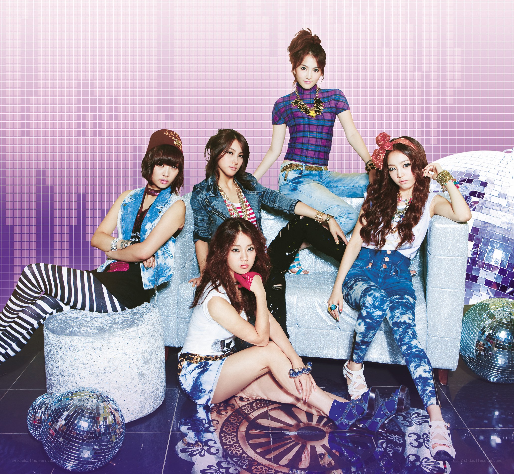 K-pop group on a couch