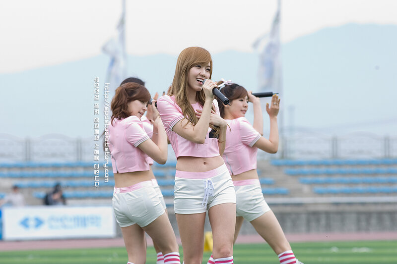 K-pop group performing on field