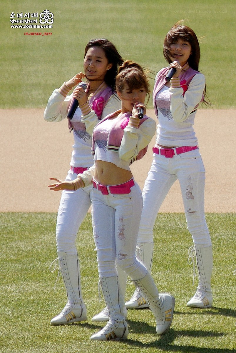 K-pop group performing on field