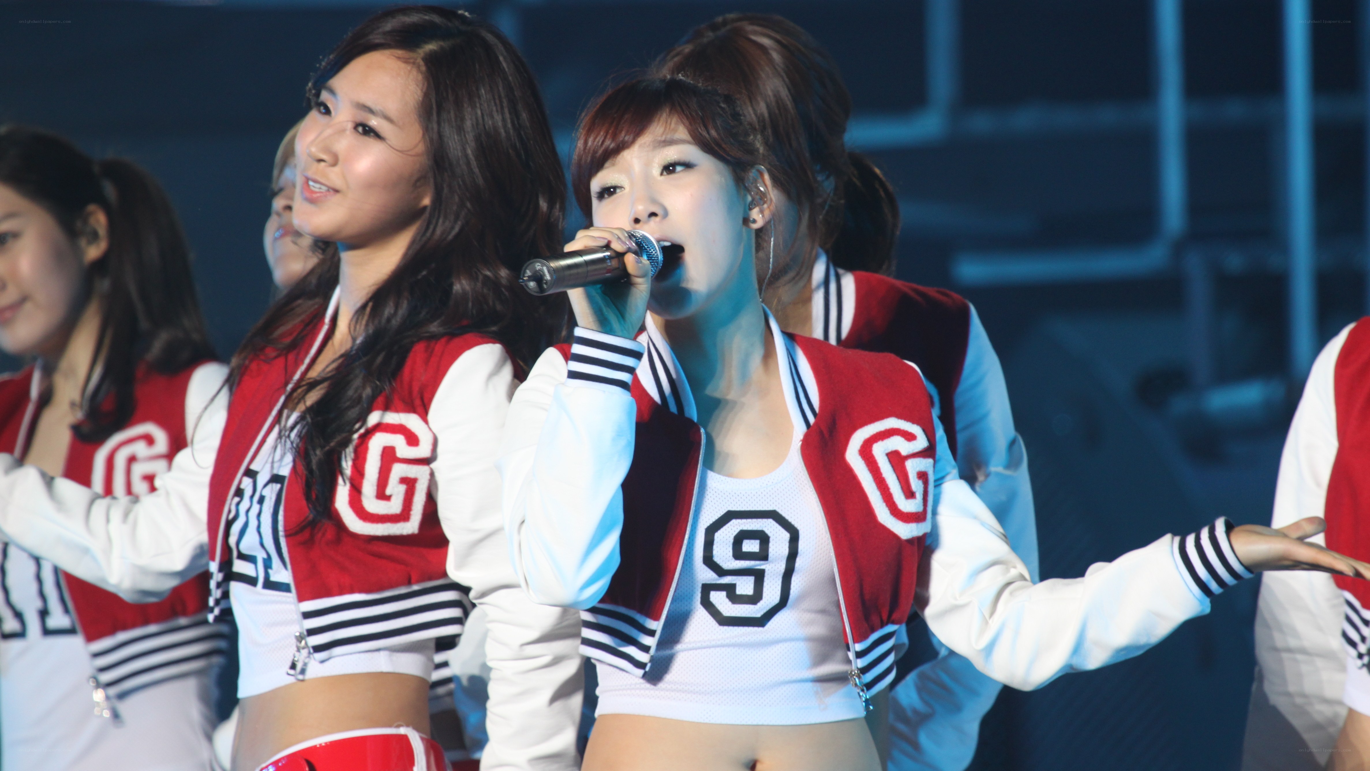 K-pop group performing on stage