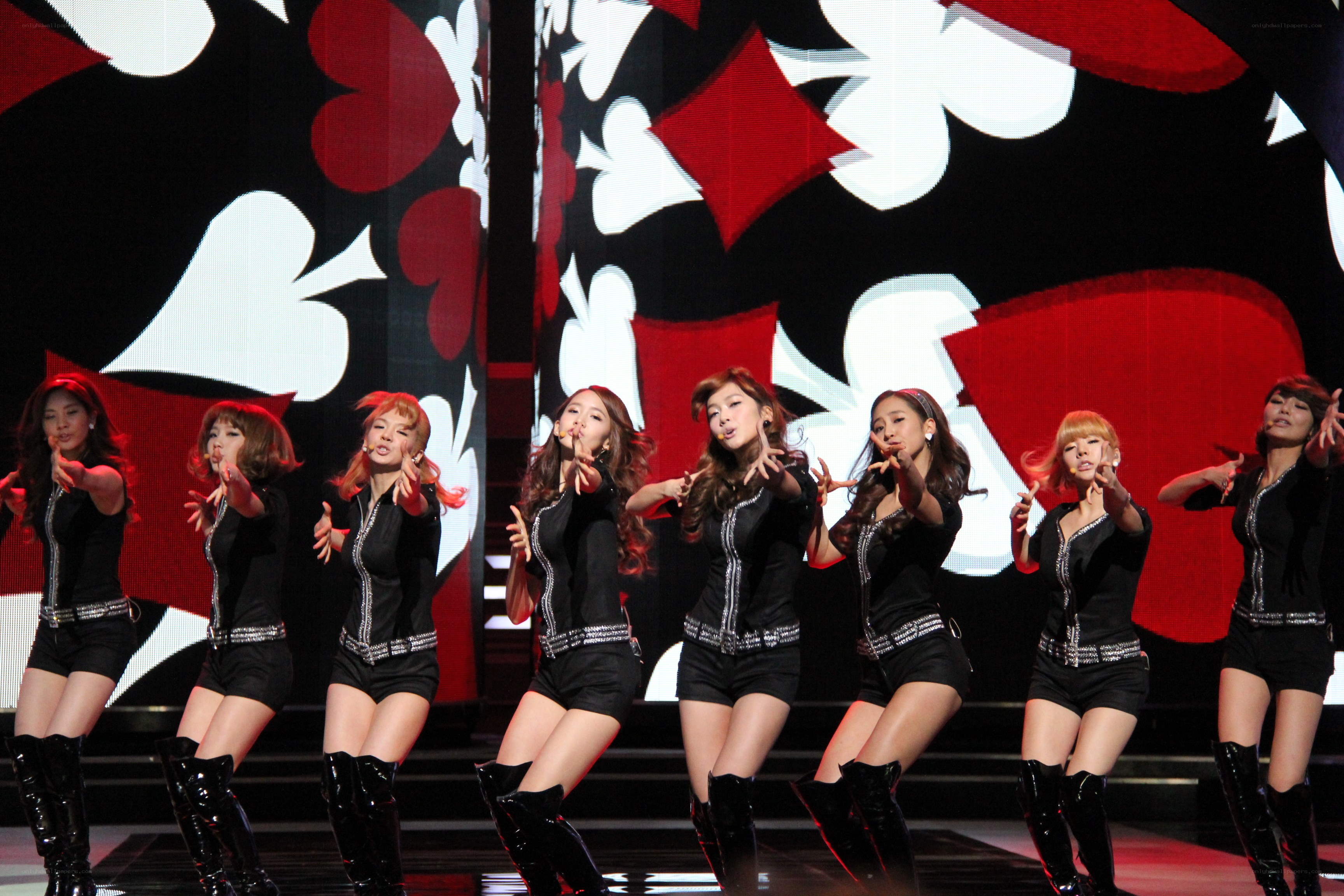 K-pop group performing on stage