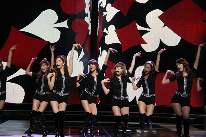K-pop group performing on stage