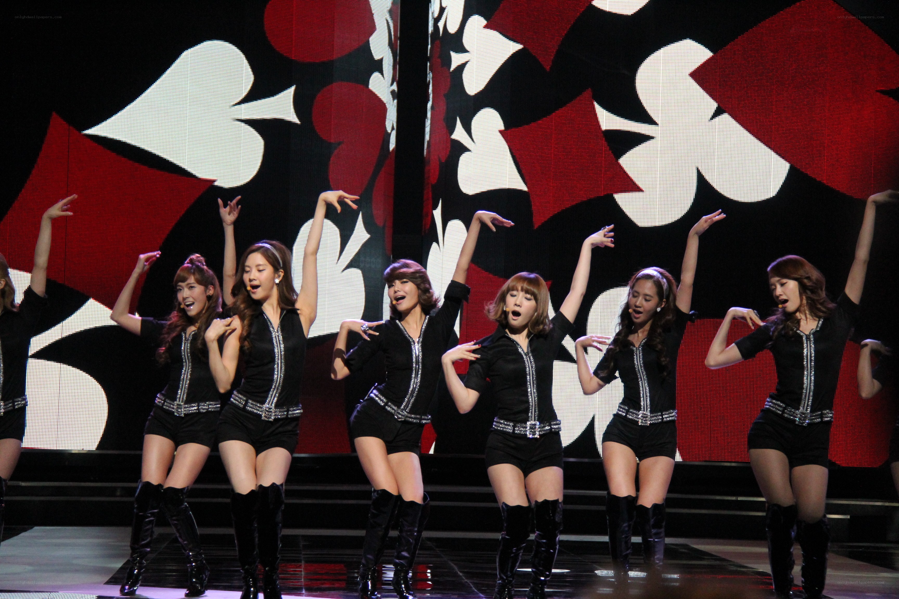 K-pop group performing on stage