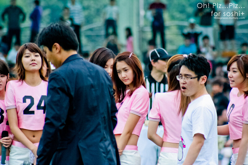K-pop group performing on stage