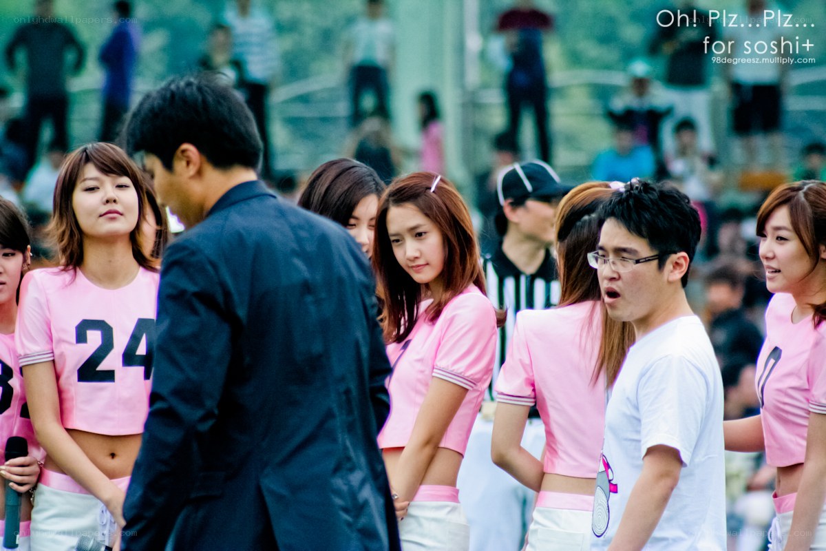 K-pop group performing on stage
