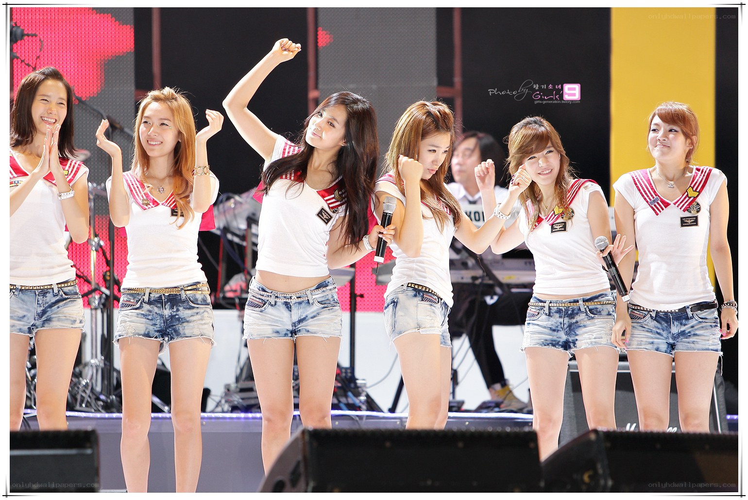 K-pop group performing on stage