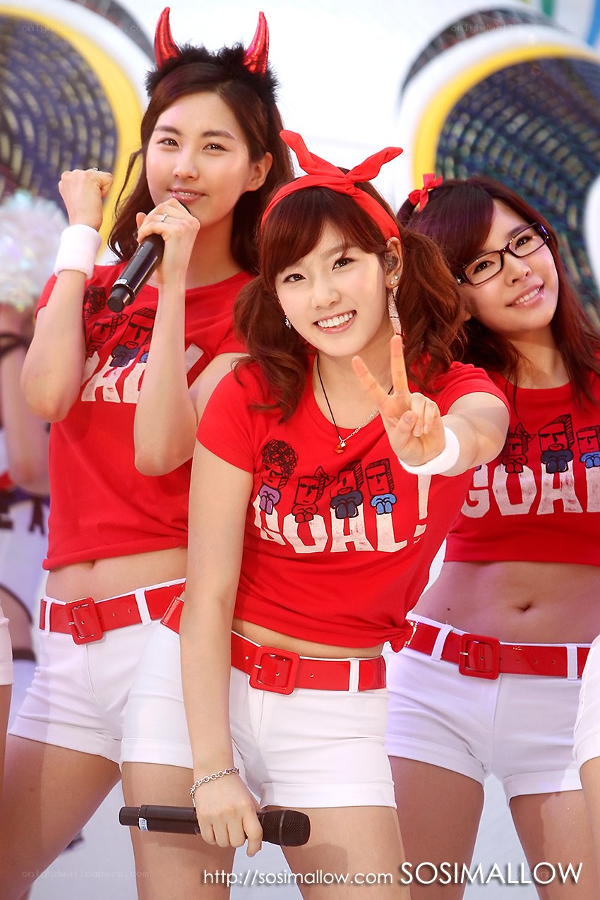 K-pop group performing on stage
