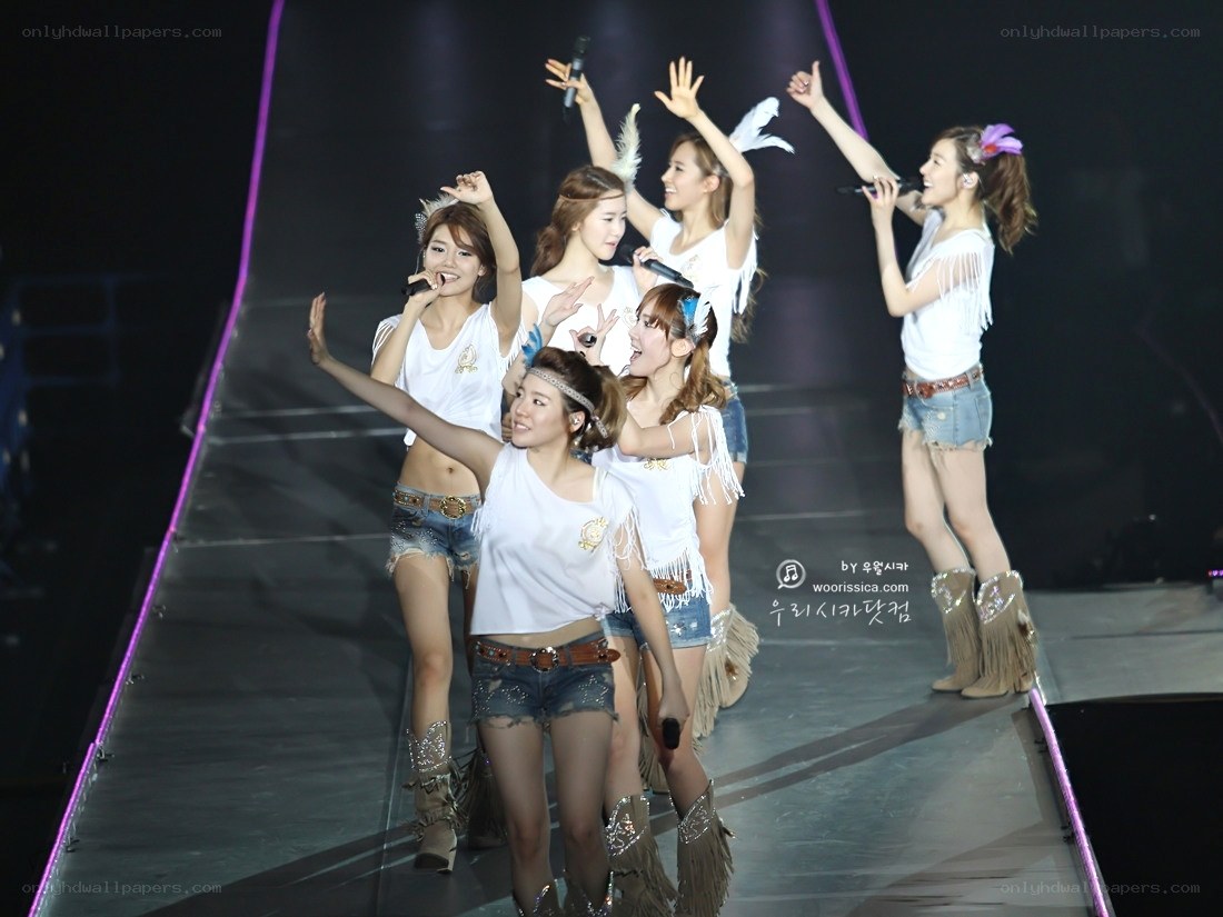 K-pop group performing on stage