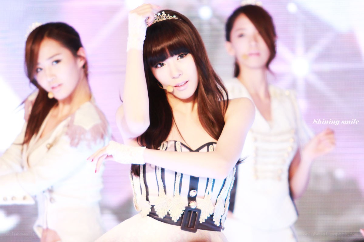 K-pop group performing on stage