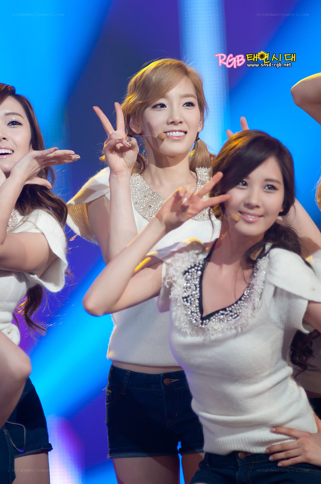 K-pop group performing on stage
