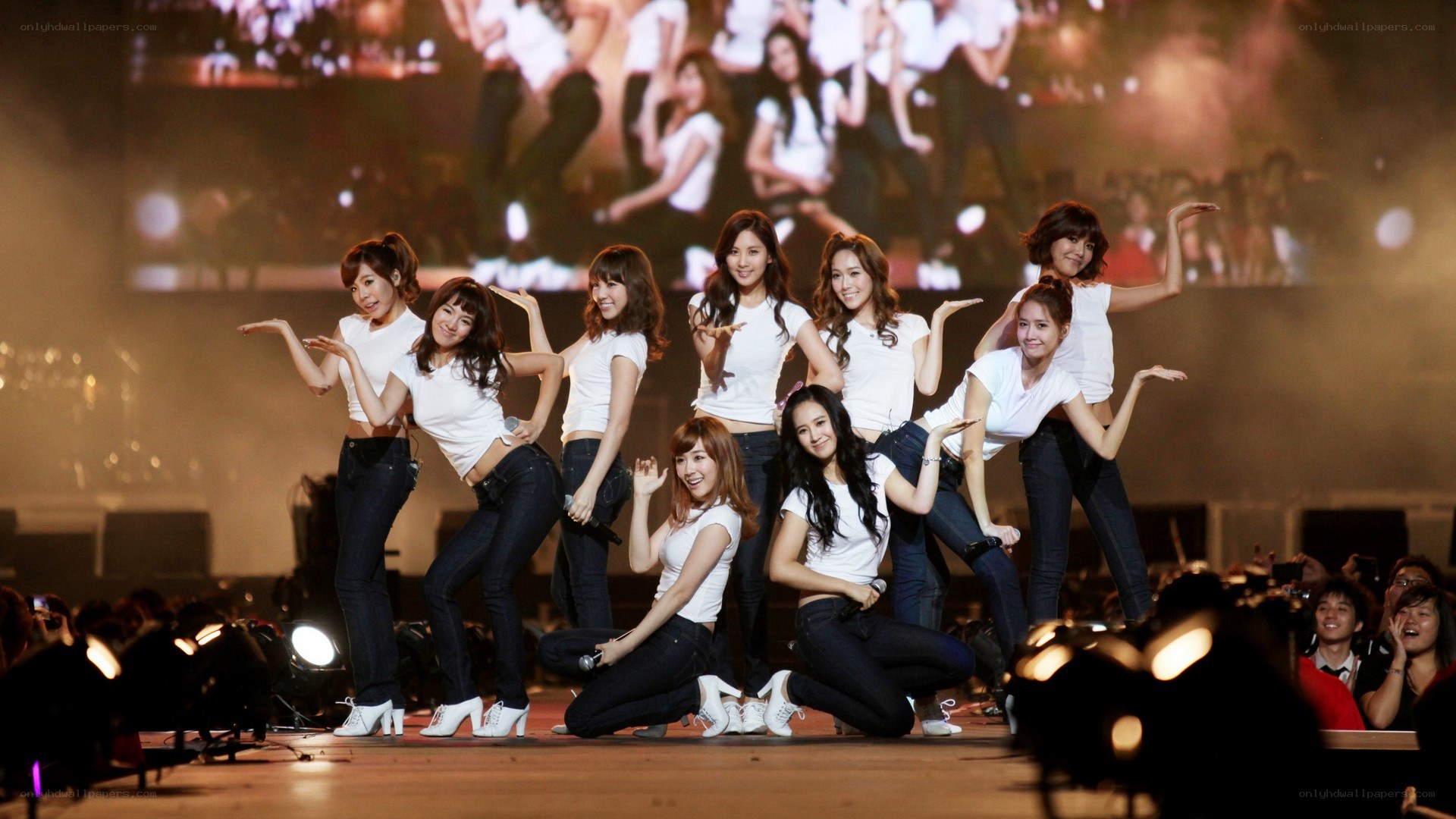 K-pop group performing on stage