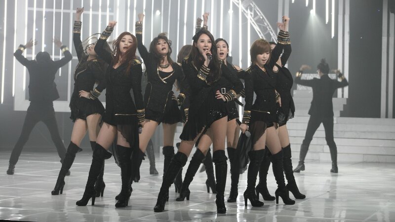 K-pop group performing on stage