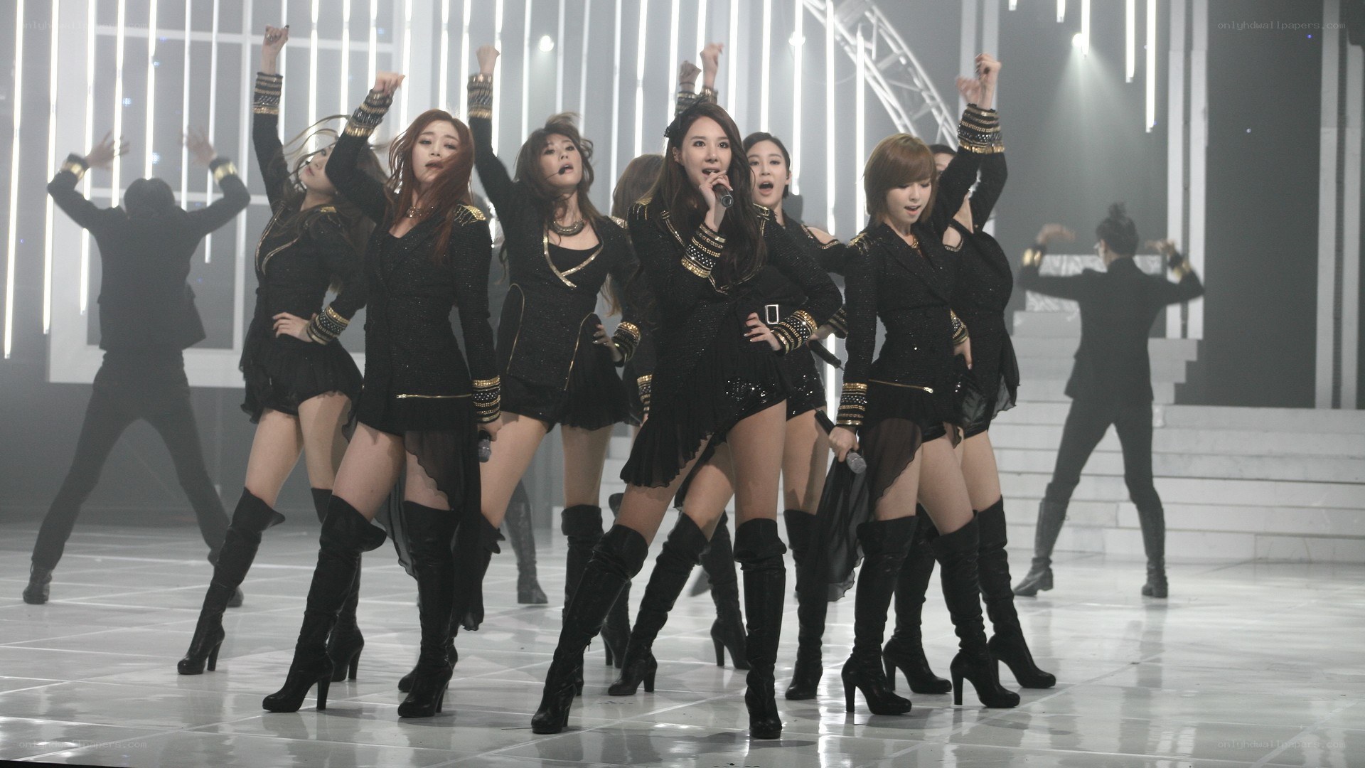 K-pop group performing on stage