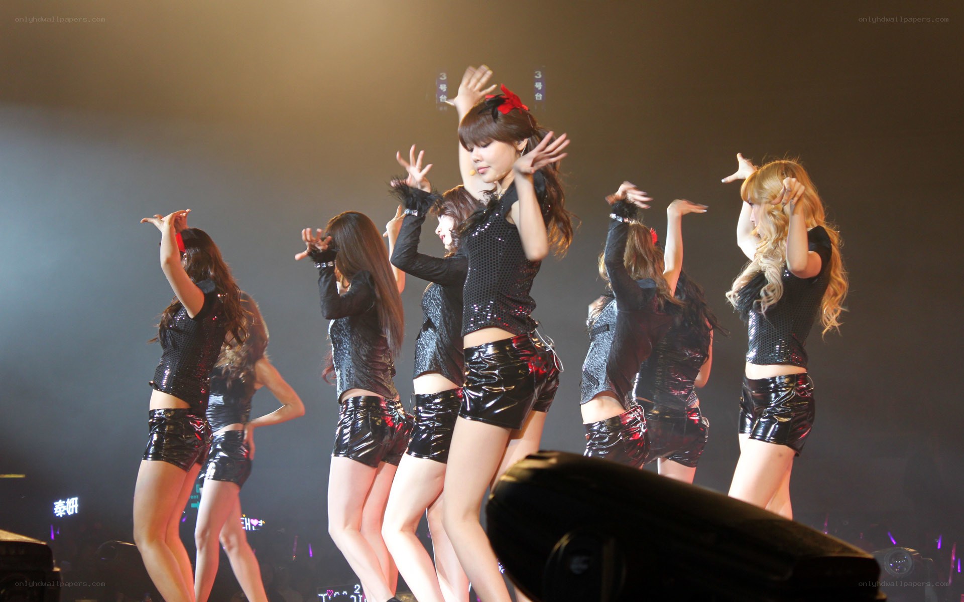 K-pop group performing on stage