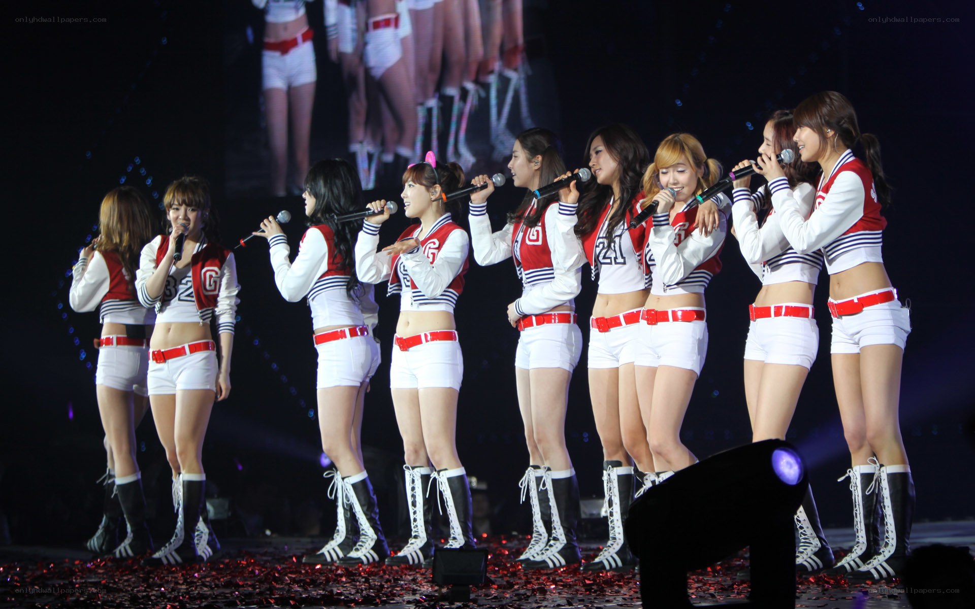 K-pop group performing on stage