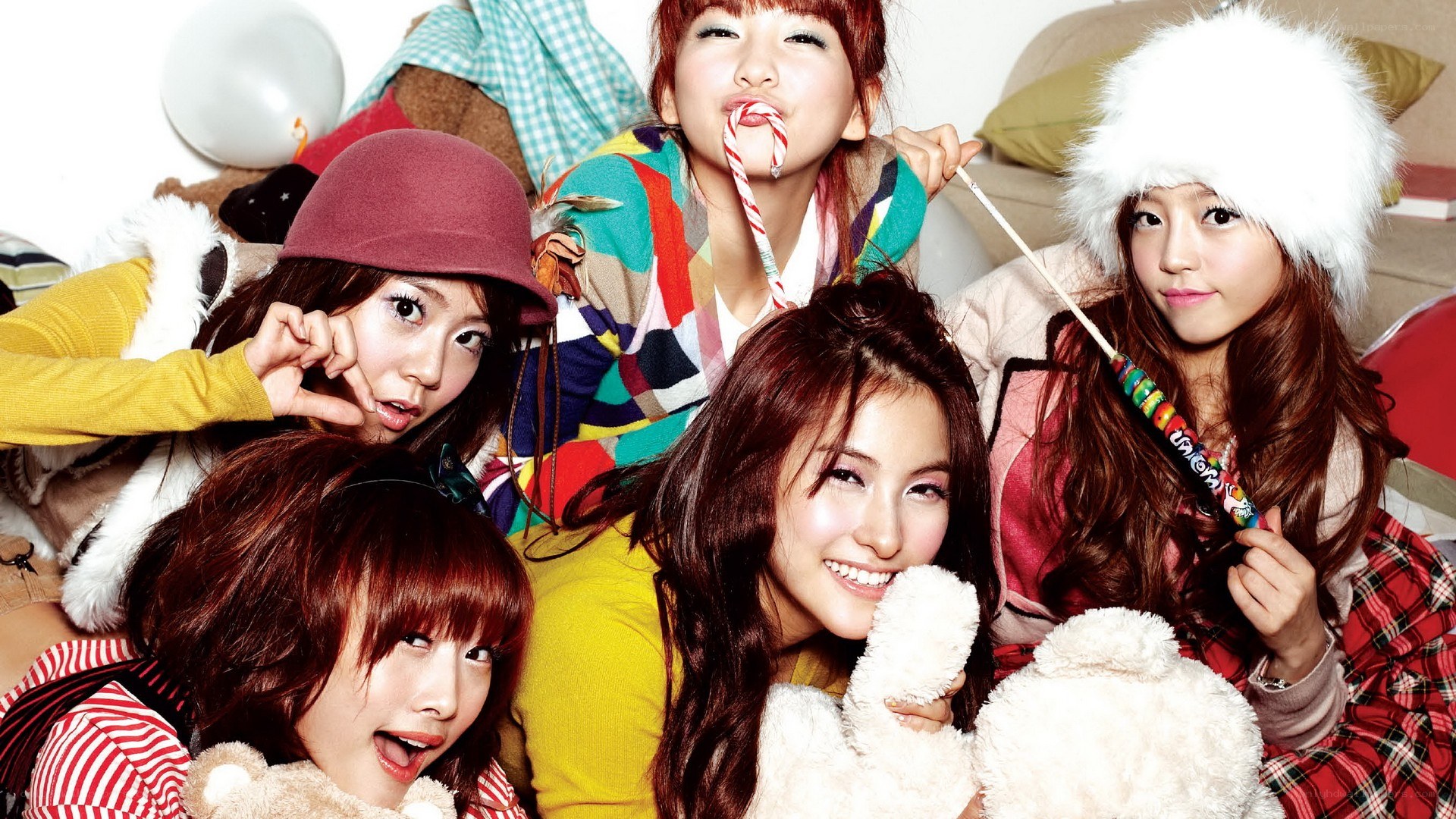 K-pop group posing playfully