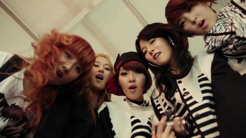 K-pop group posing together