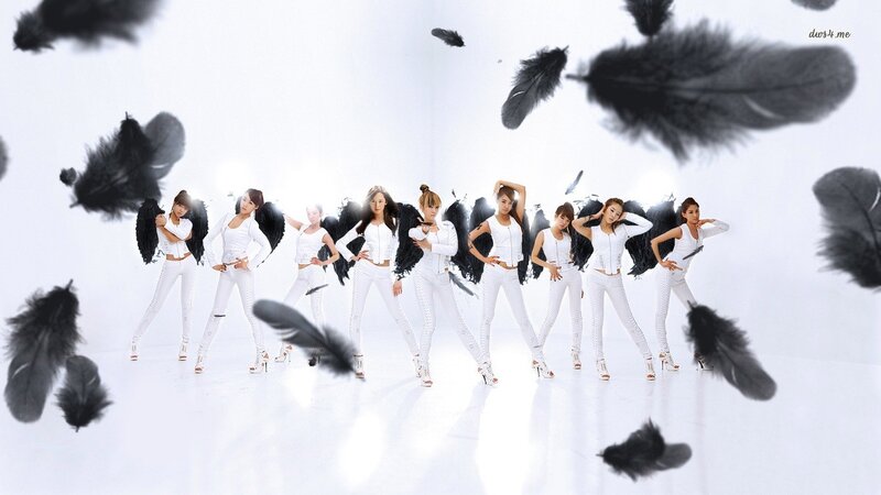 K-pop group with black feathers