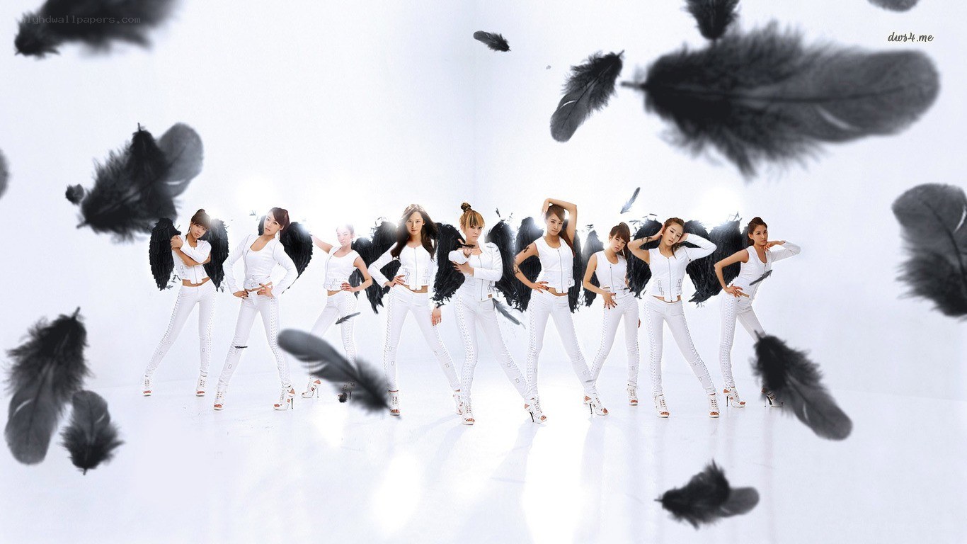 K-pop group with black feathers