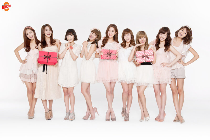 K-pop group with gift boxes
