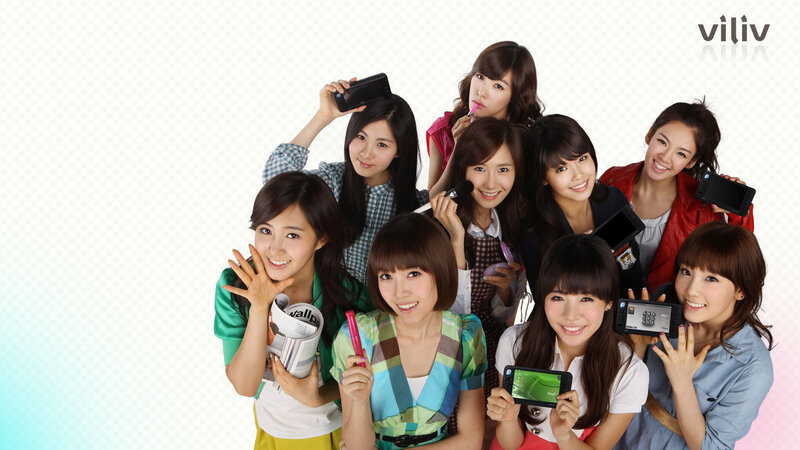 K-pop group with mobile phones