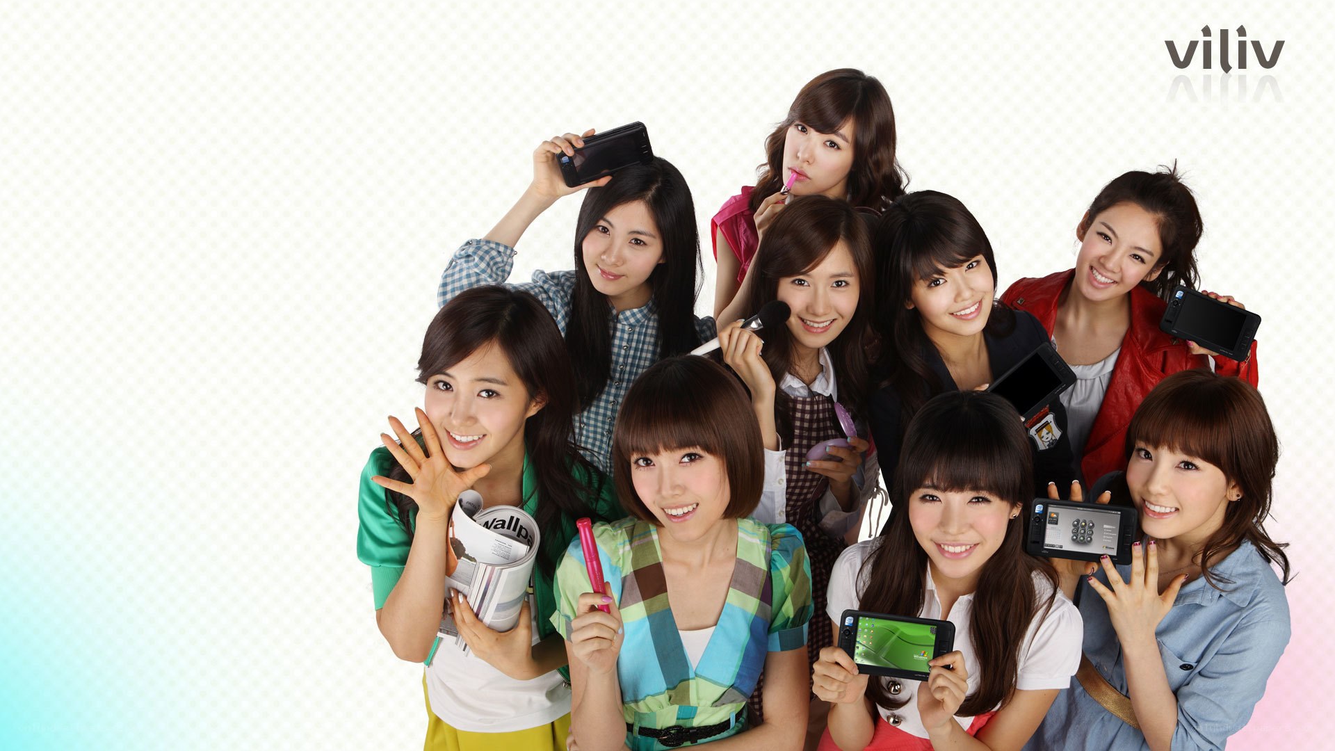 K-pop group with mobile phones