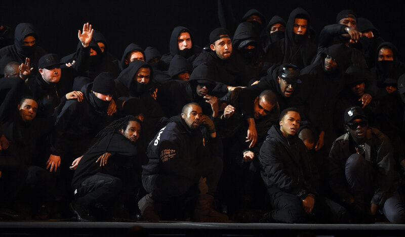 Kanye West and performers on stage