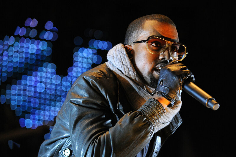 kanye west performing on stage
