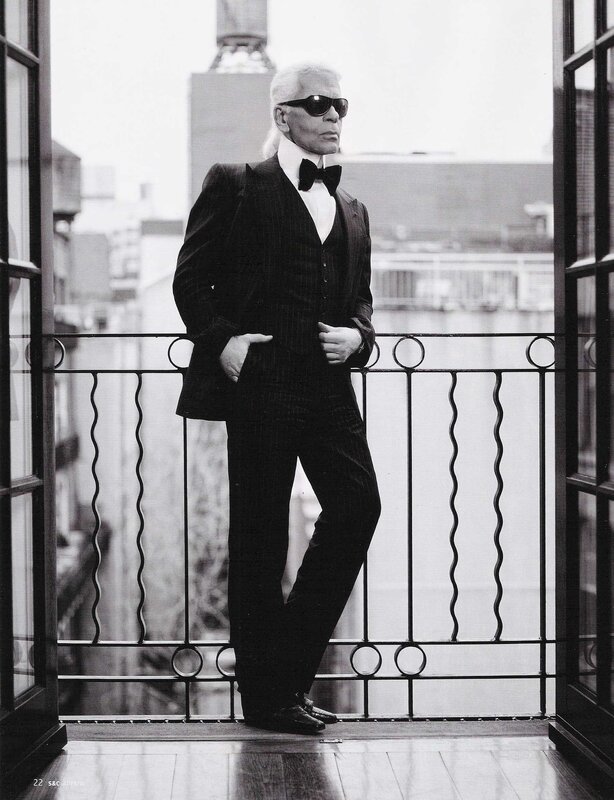 Karl Lagerfeld on a balcony
