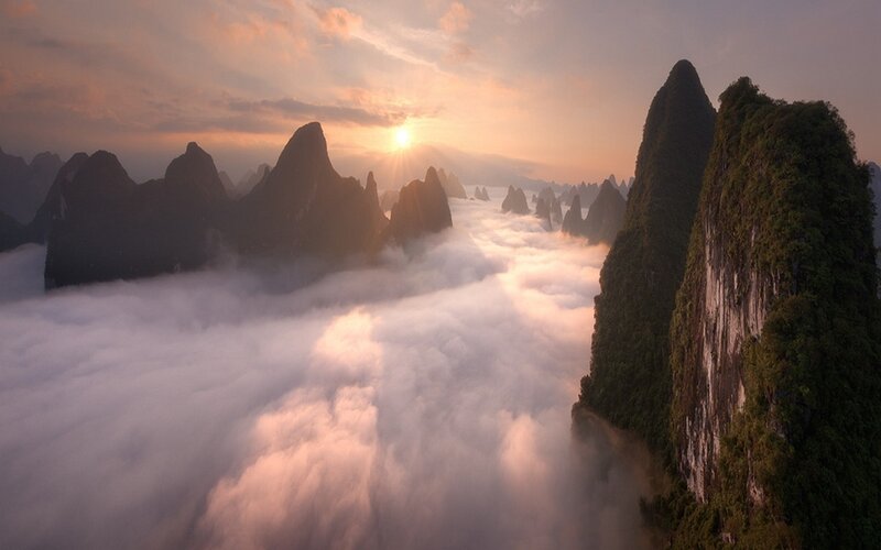 Karst Mountains Above Clouds