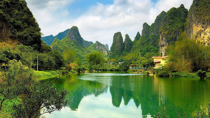 Karst Mountains and Lake — Green, Serene
