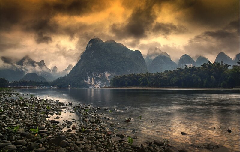 Karst Mountains and River — Orange, Dramatic, Sunset
