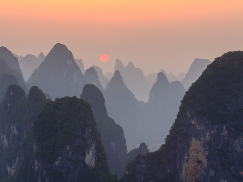 Karst Mountains at Sunset — Orange, Serene